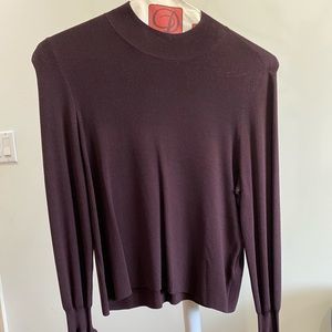 Wine colored top with flared sleeves